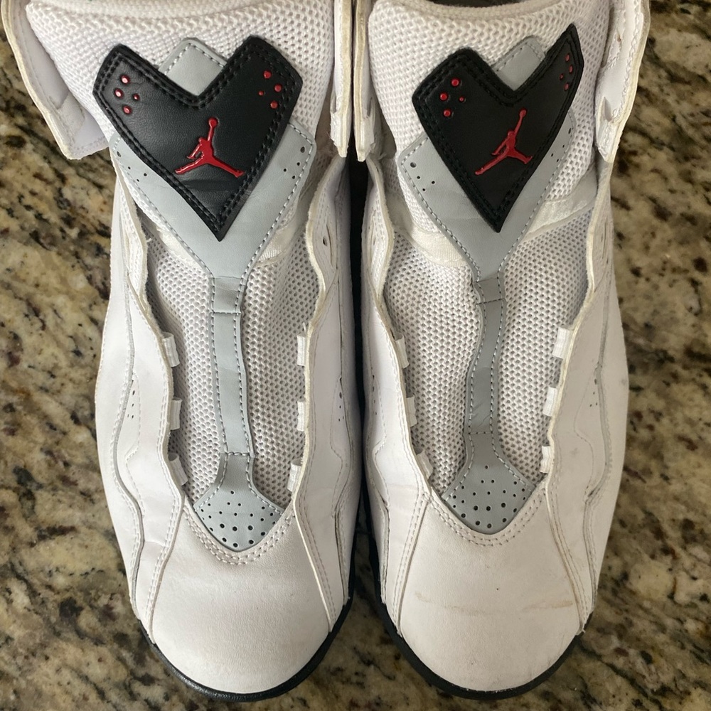 White and Gray Sneakers with Red Logo